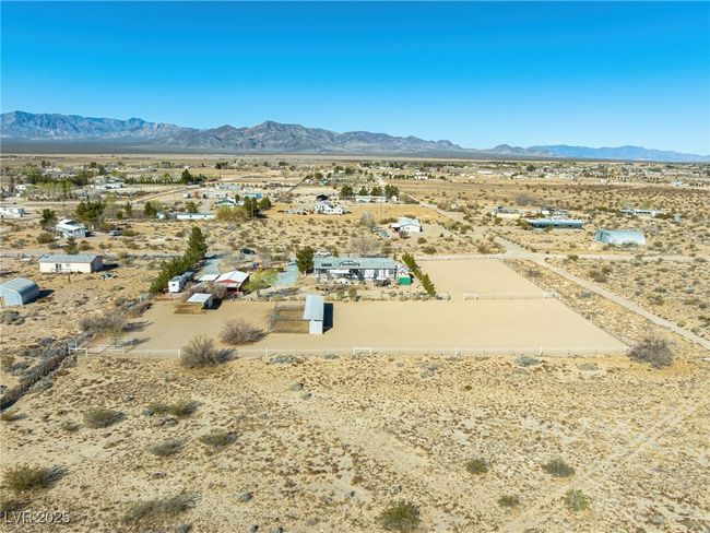 Birds eye view of property featuring a mountain view, a desert view, and a rural view | Image 84
