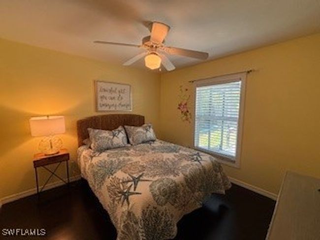 Bedroom with baseboards and ceiling fan | Image 22