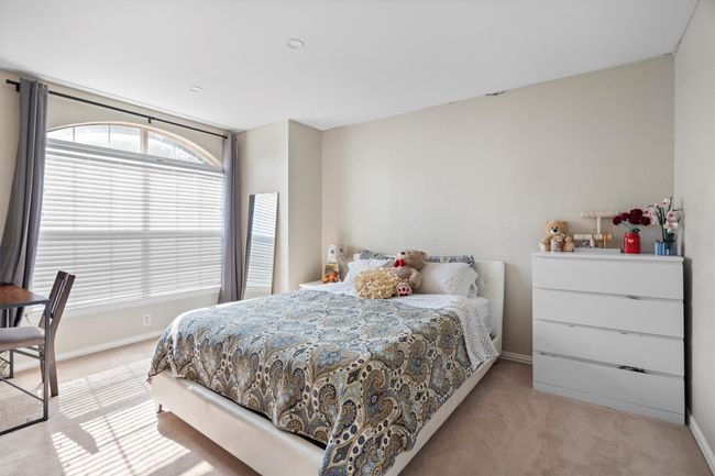 Bedroom featuring carpet flooring and baseboards | Image 33