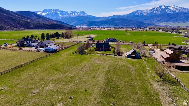 Drone / aerial view featuring a rural view and a mountain view | Image 5