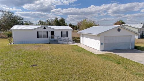 1151 Peaceful Ln, MOORE HAVEN, FL, 33471-4939 | Card Image