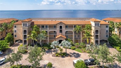 View of building exterior featuring a water view | Image 1