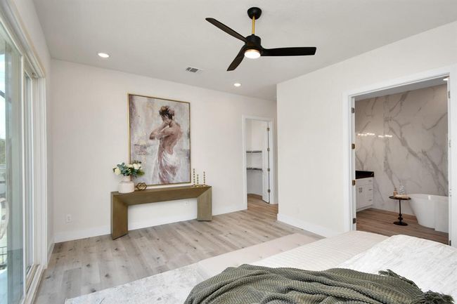 The primary suite has HIS & HER closets & wait till you see your en-suite bath. | Image 15