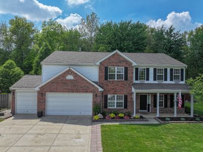 This 4 Bedroom 2.5 Bath is situated on a fantastic cul-de-sac lot with private, wooded, fenced-in backyard and 3-car garage! | Image 2