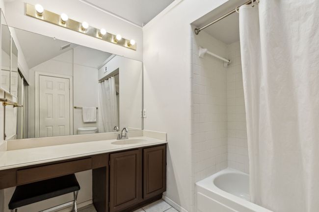 Primary Bathroom with vanity area, large walk in closet, tub/shower combo | Image 26