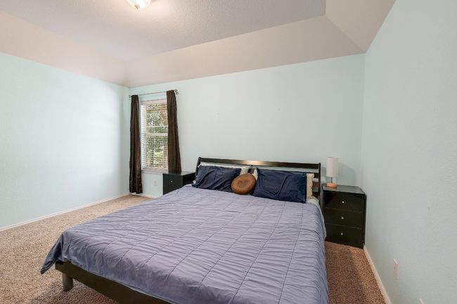 Each guest bedroom is spacious and inviting, offering plenty of room for personalization, ensuring that your guests always feel at home with comfort and privacy | Image 28