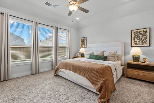 Bedroom featuring carpet flooring, ceiling fan, and recessed lighting | Image 23