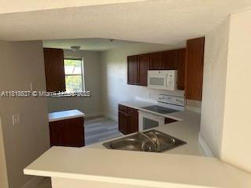 apt-208-8741 Wiles Rd, Coral Springs, FL, 33067-1859 | Card Image