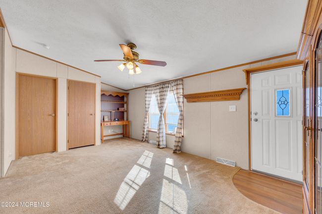 Living Room with view of front door | Image 4