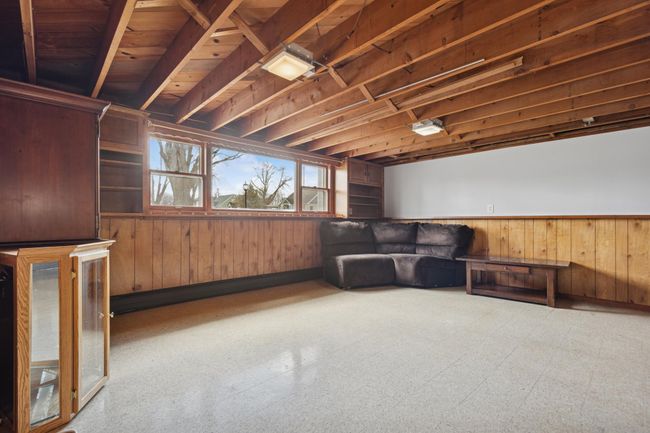 The lower level features a large family room! | Image 12