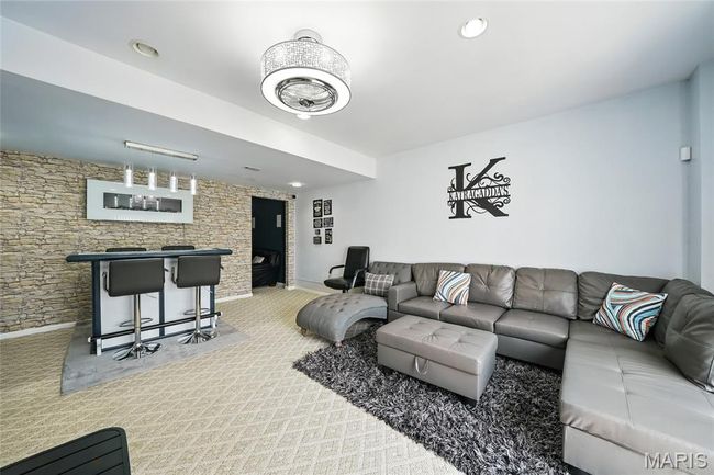 Carpeted living area featuring recessed lighting | Image 24
