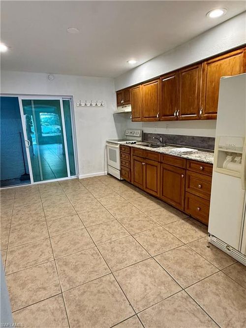 27831 Quinn St, BONITA SPRINGS, FL, 34135-5990 | Card Image