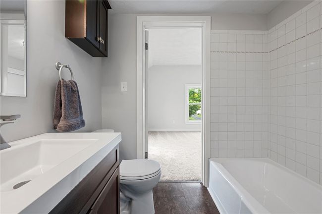Full bathroom with a tub on the second floor | Image 17
