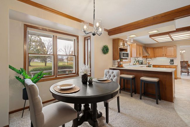 Cozy Dining next to Kitchen | Image 13