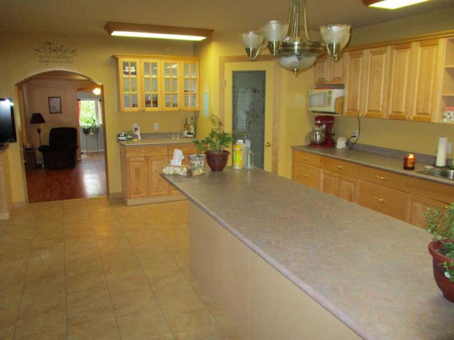 #308 6th Avenue Se, Home with 4 bedrooms, 2 bathrooms and 2 parking in Manning AB | Image 5