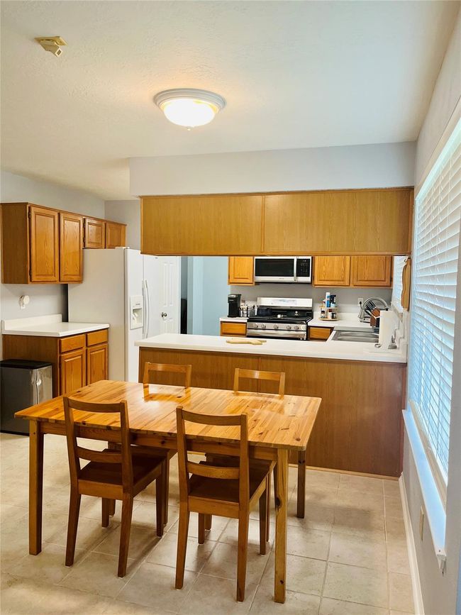 BREAKFAST AREA VIEW FROM LIVING ROOM | Image 19