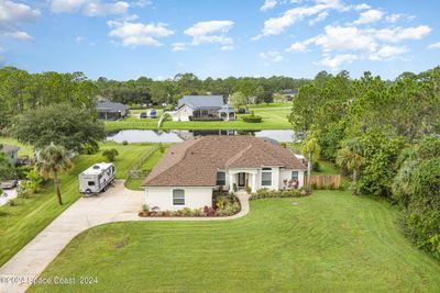 5010 Fawn Lake Boulevard, House other with 4 bedrooms, 3 bathrooms and null parking in Mims FL | Image 1