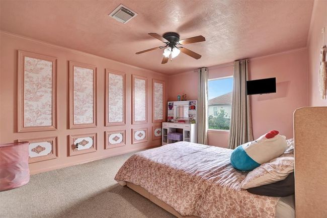 Bedroom 5 has been recently renovated with a charming princess theme, offering a delightful and inviting atmosphere. | Image 40