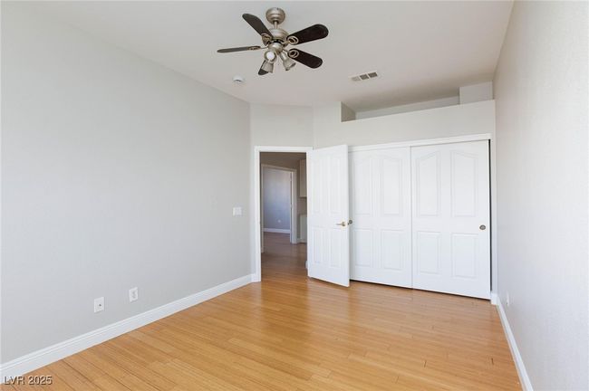 Unfurnished bedroom with visible vents, light wood-style flooring, and baseboards | Image 39