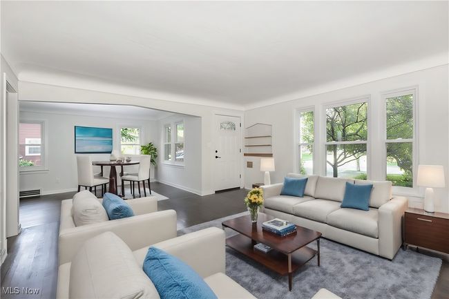 Living room with hardwood / wood-style floors and a wealth of natural light | Image 8