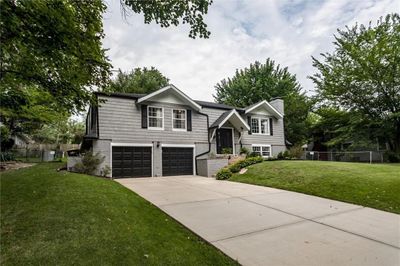 Split foyer home with coveted two car garage featuring new exterior paint ('23) & newer landscaping | Image 3