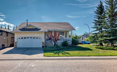 25 W Gissing Rd, House detached with 3 bedrooms, 3 bathrooms and 6 parking in Cochrane AB | Image 1