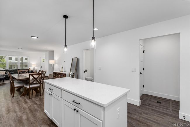 Island provides additional storage and counter space | Image 5