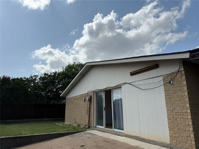 Back of property with a patio area and brick siding | Image 21