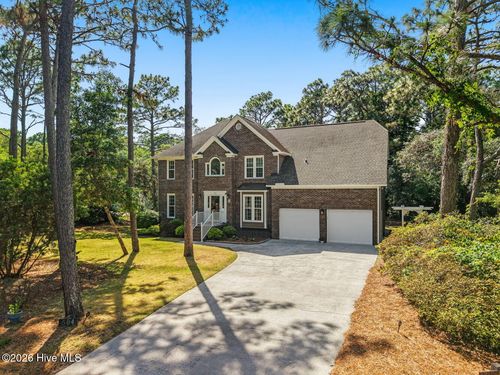 504 Perwinkle Way, Caswell Beach, NC, 28465-8454 | Card Image