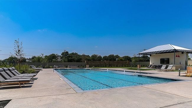 Community pool featuring a patio area | Image 19