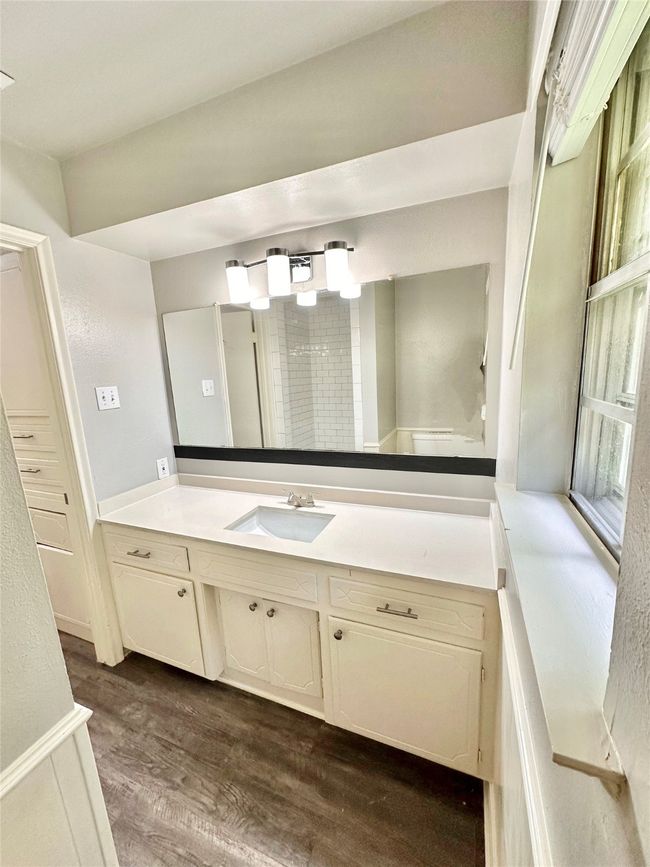 Bathroom featuring wood finished floors and vanity | Image 21