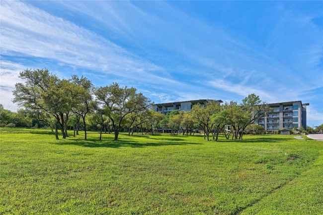 View of your backyard from the shoreline serving as the community's 14-acres HOA park. | Image 24
