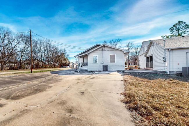 Rear view of house featuring central AC unit | Image 34