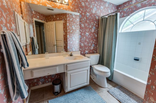 Spacious 2nd bathroom with lots of light, vanity area. | Image 26