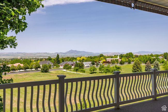 View of mountain backdrop with nearby suburban area | Image 35