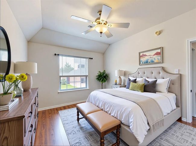 Bedroom 4 upstairs with ceiling fans and laminate | Image 37