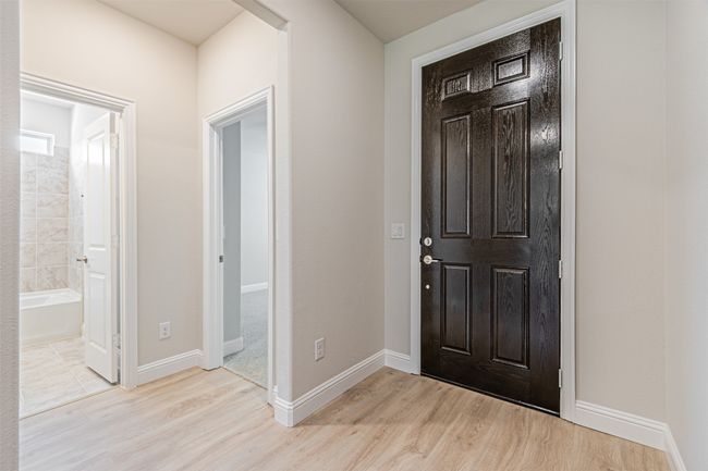 Foyer with light wood-style floors | Image 5