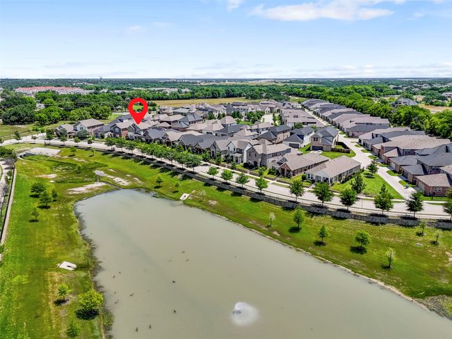 Aerial perspective of suburban area with a nearby body of water | Image 39