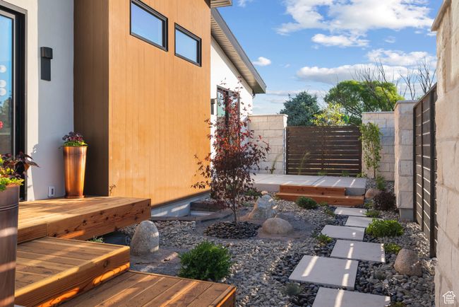 View of yard with a wooden deck | Image 83