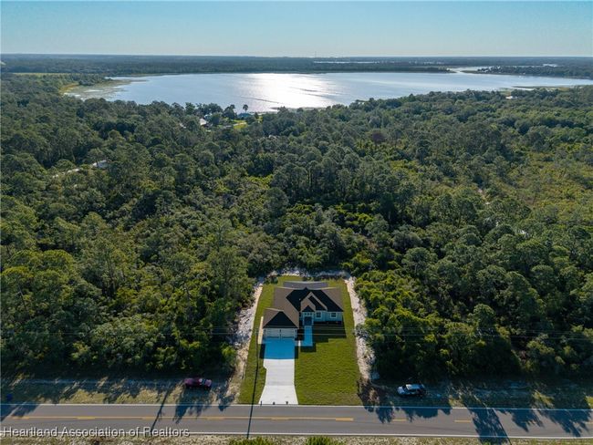 9816 S Orange Blossom Blvd, House other with 3 bedrooms, 2 bathrooms and null parking in Sebring FL | Image 4
