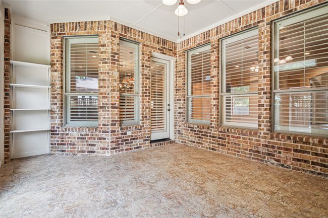 Sun room overlooking backyard. Fully cooled and heater for all year round enjoyment. | Image 34