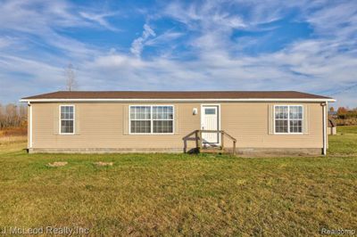 7515 Center Road, Home with 3 bedrooms, 2 bathrooms and null parking in Watertown Twp MI | Image 2