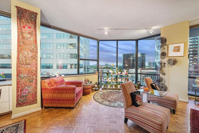The spacious living area offers flexibility to create cozy sitting nooks or arrange the space to suit your lifestyle. | Image 4
