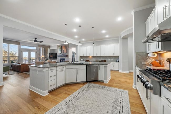 This dreamy kitchen has everything you need to effortlessly prepare meals, bake or hang out at the end of the day. | Image 15