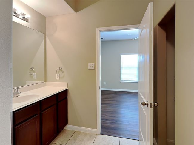 Bathroom with vanity and tile patterned flooring | Image 8