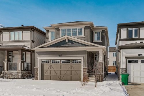 2099 Windbury Crescent Sw, Home with 3 bedrooms, 2 bathrooms and 4 parking in Airdrie AB | Card Image