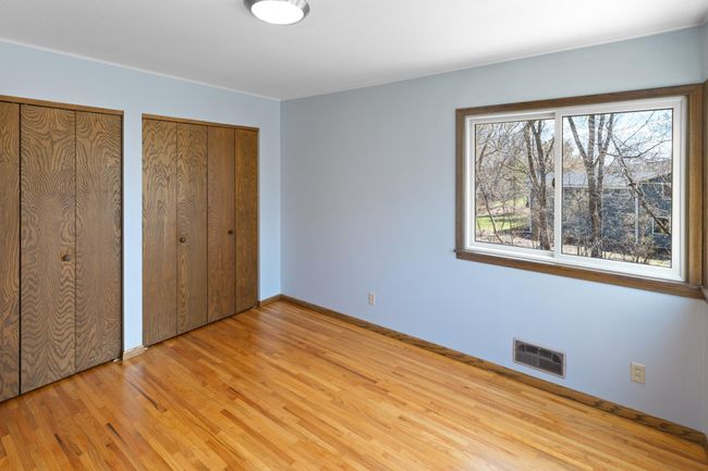 Second bedroom featuring dual closets. | Image 19