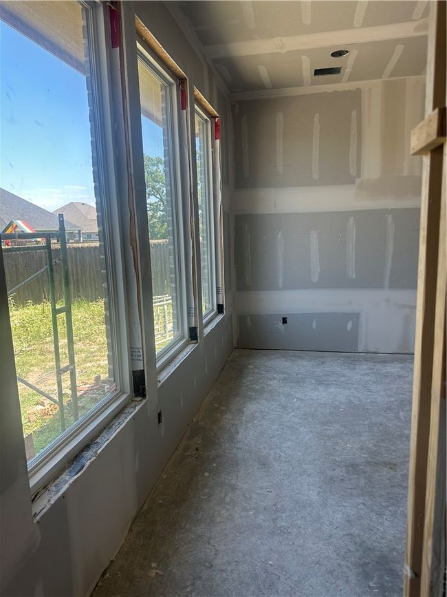 Unfurnished sunroom featuring plenty of natural light | Image 4