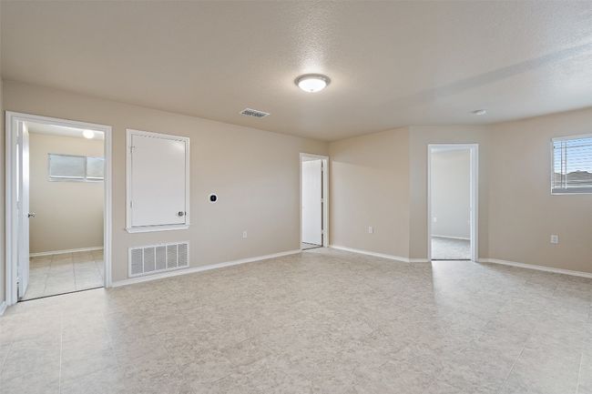 Unfurnished room featuring baseboards | Image 15