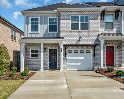 The Charleston is a corner unit and features the primary bedroom on the first floor. Photo from previously built Charleston | Image 1